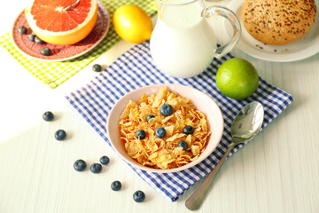 Healthy breakfast with fruits and berries on table close up