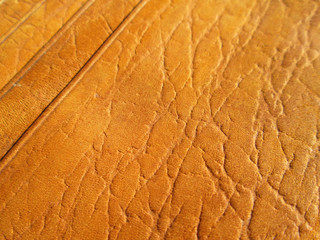 close up pattern of brown purse