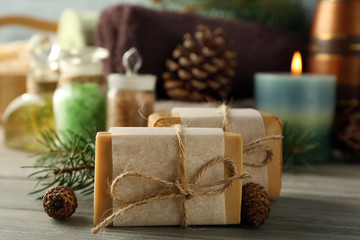 Spa treatments with pine extract on wooden background