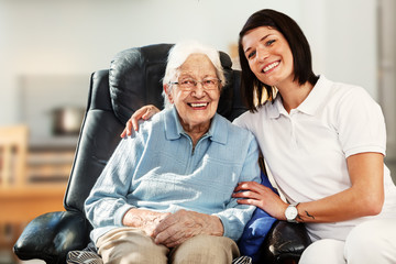 Nurse caring for elderly person