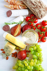 Still life with various types of Italian food and wine