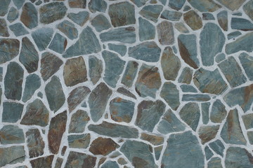 Blue irregular stone wall background