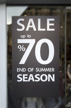 Fototapeta Retail Image Of A Sale Sign In A Clothing Store Window (With Sha