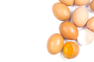 Cardboard egg box and many eggs
