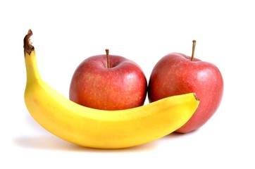 Red apples and banana, on white background isolated