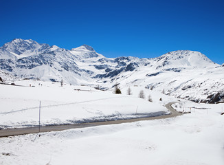 Fototapeta na wymiar Mountain road in Swiss alps. Simplon Pass, Valais, Switzerland