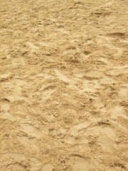 sea sand with footprints