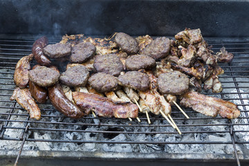 Various meats like chicken, sausage, steak and corn wrapped in a © ververidis