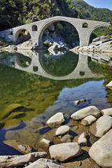 Fototapeta na wymiar Amazing view of Devil's Bridge near Ardino town, Kardzhali Region, Bulgaria