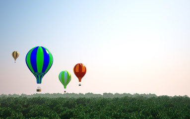 A lot of balloons flight over forest