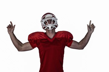 Rugby player pointing up and cheering