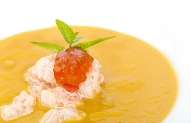 soup with shrimp and tomato on a white background