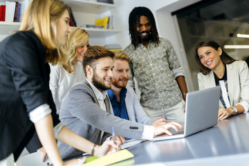 Colleagues brainstorming in office