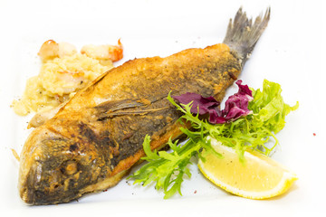 sea fish cooked on the grill