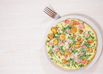 omelet with mushrooms, ham and cheese