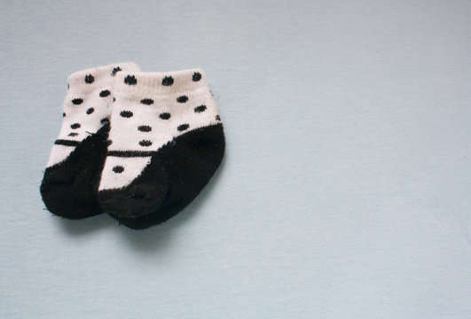 A pair of new born baby socks.