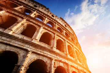 Colosseum in Rome, Italy. Amphitheatre in sunset light.