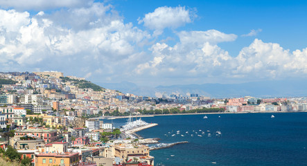 Fototapeta na wymiar Gulf of Naples, cityscape under blue sky