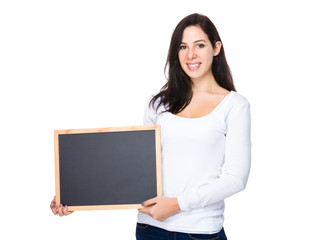 Brunette woman show with chalkboard