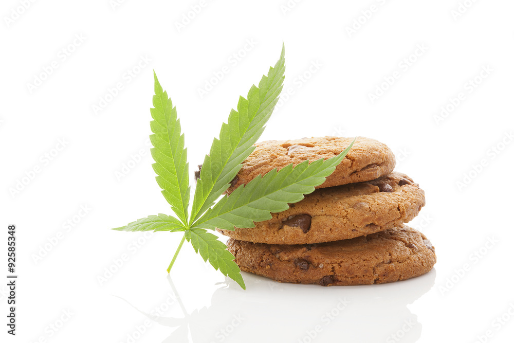 Wall mural cookies with hemp leaf isolated.