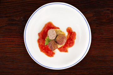 Meatballs on plate, top view.