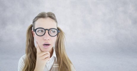 Composite image of female geeky hipster looking confused 