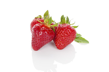 Strawberries isolated over white.
