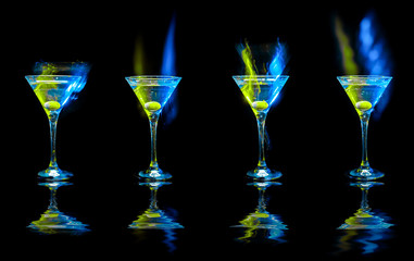 cocktails with olives in glasses