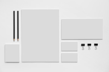 Blank branding mockup with gray business cards on white