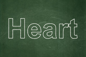 Medicine concept: Heart on chalkboard background