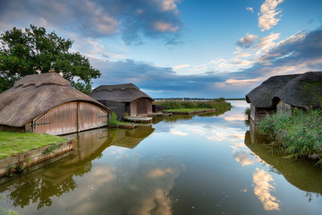 Thatched Boat Houses - Powered by Adobe