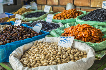 Dry fruits and spices like cashews, raisins, cloves, anise, etc.