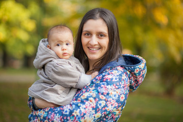 Mother and her child enjoy the early autumn