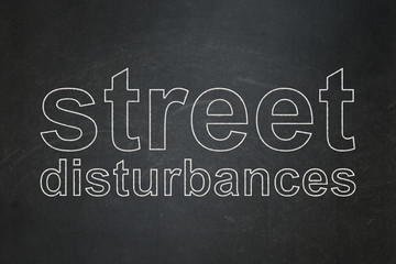 Obraz premium Political concept: Street Disturbances on chalkboard background