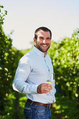 Man with a glass of white wine