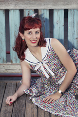 Fototapeta premium pinup young woman in vintage style clothing