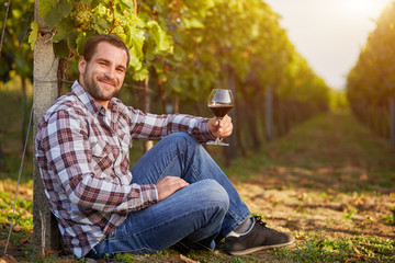 Winemaker with a glass of red wine