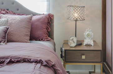 classic lamp style on wooden table side in bedroom