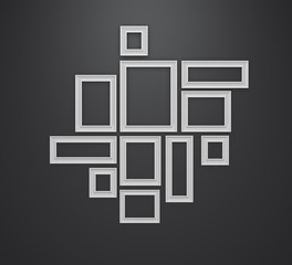 White frames on black wall