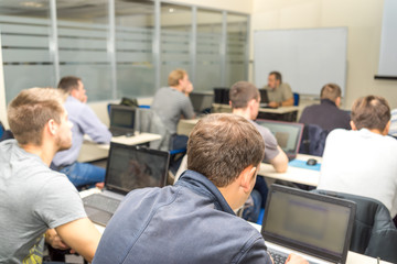 Meeting in a conference hall.