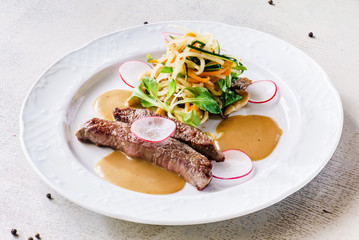 steak with vegetables