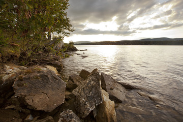 Fototapeta na wymiar Sunset view on Onota Lake in the Berkshire Mountains of Western Massachusetts.