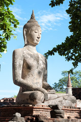 Obraz premium Large stone Buddha statue at Wat Mahathat, Ayutthaya, Thailand