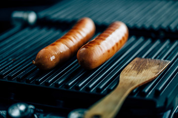 sausages on the grill