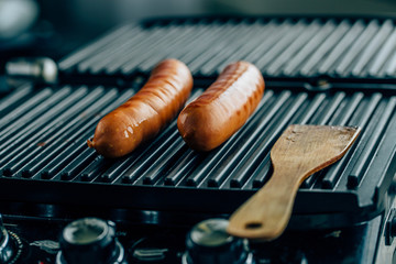 sausages on the grill