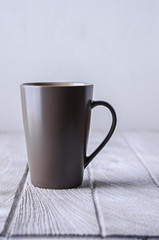 coffee cup on white wooden table