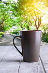 coffee cup on white wooden table