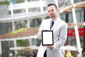 Business man working on digital tablet