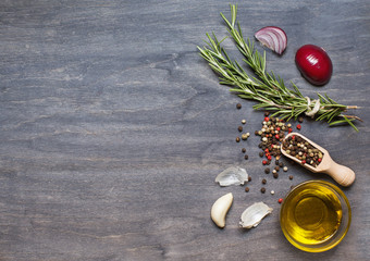 Potatoes, mushrooms and condiment on dark wooden table