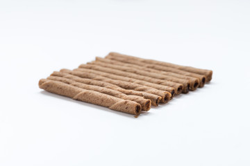 Chocolate wafer sticks isolated on white background.